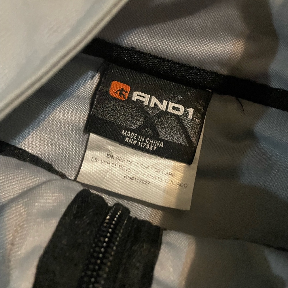 AND1 men’s medium zip up sweater.